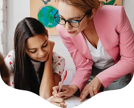 A psychologist talking to a teen in an educational assessment session